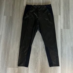 Size Large, express faux leather leggings with black fabric details.